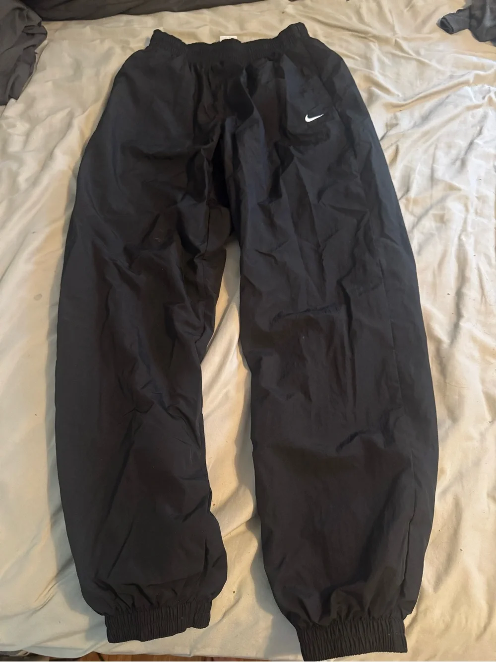 Nike Black Windbreaker Track Pants with White Swoosh